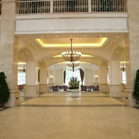 Blue Sky Hotel Яньтай Экстерьер фото
